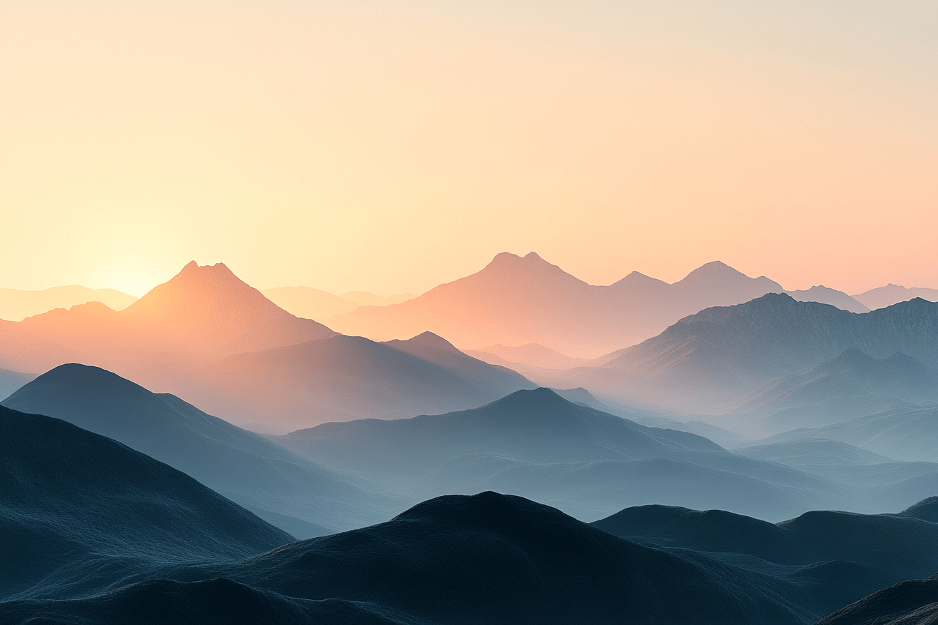 A stunning mountain range with a vibrant sunset casting warm colors across the peaks.