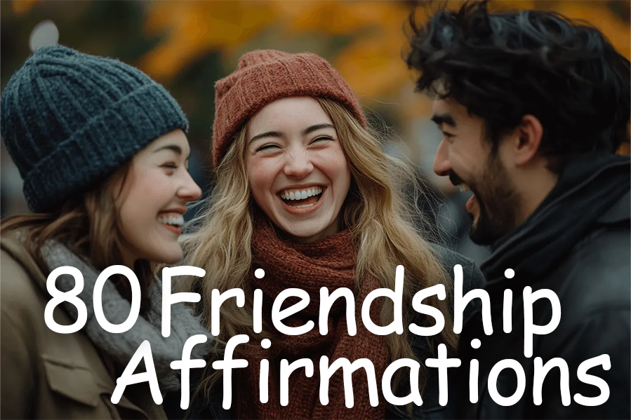 Three people, bundled in warm hats and scarves, share a laugh outside on a brisk day.