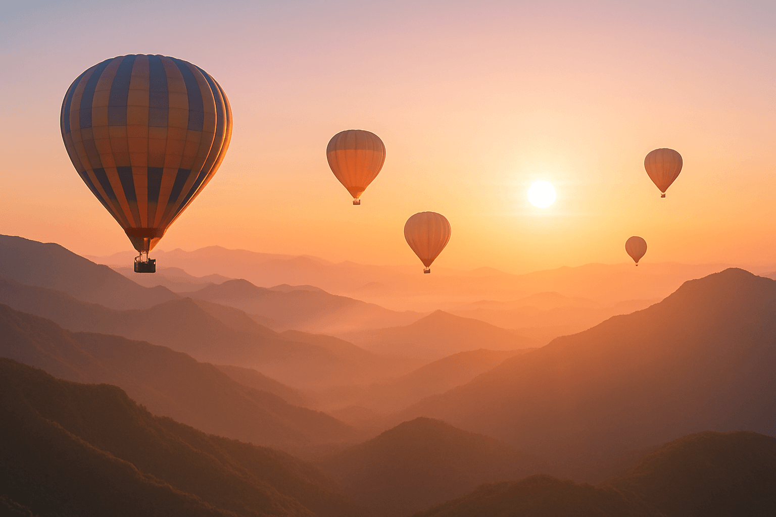 Colorful hot air balloons soar over mountains during a vibrant sunset.